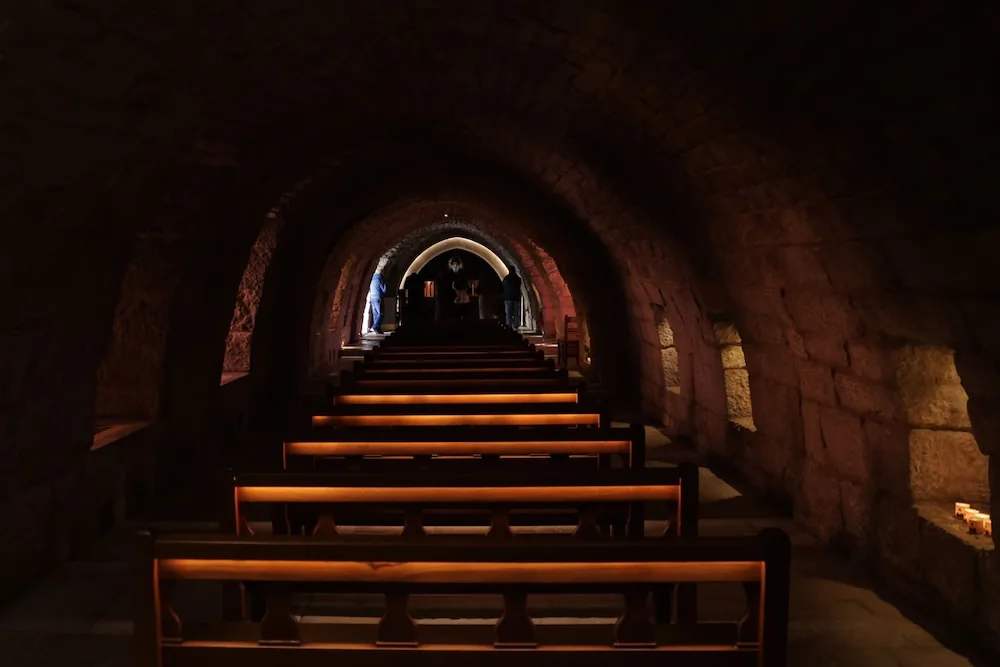 The candlelit tomb chapel of Saint Charbel in Annaya