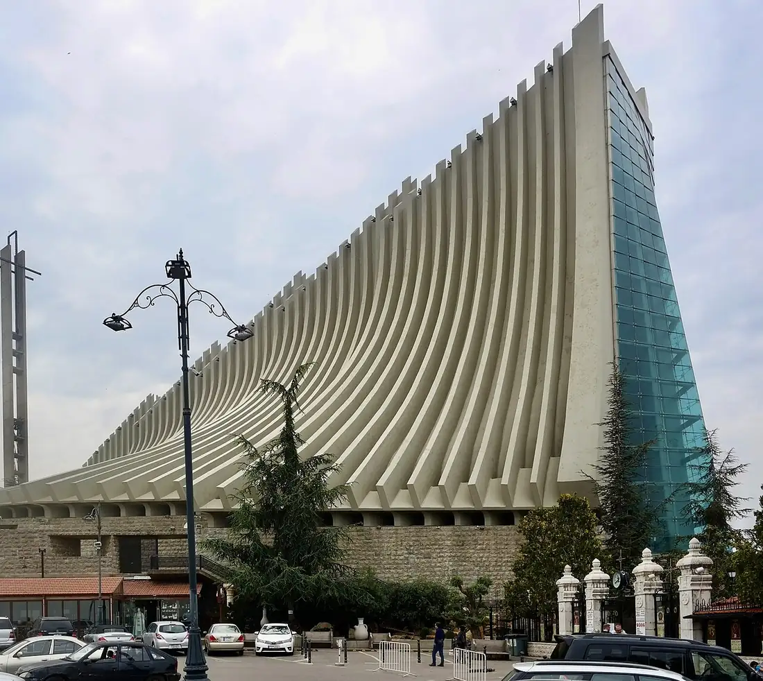 The modern Our Lady of Lebanon Basilica at Harissa, with its fan of concrete ribs and a tall glass front