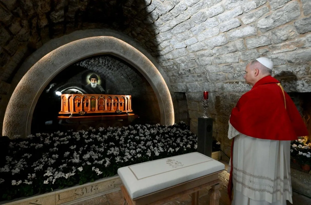Pope Leo XIV praying at the tomb of Saint Charbel in Annaya, December 1, 2025. Photo: Vatican Media / Vatican News